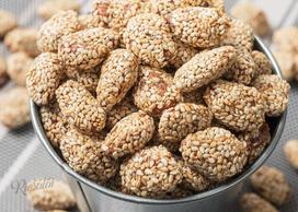 Kepinti karamelizuoti migdolai su sezamo sėklomis, 1 kg