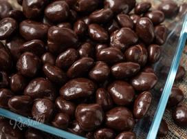 Spanguolės juodajame šokolade, 1 kg 