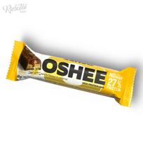 Baltyminis batonėlis „OSHEE“ vanilės skonio su karamele 27% baltymų, 49 g