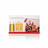 Kūno priežiūros priemonių rinkinys Clarins: kūno aliejus 100 ml + dušo želė 30 ml + drėkinamasis balzamas 30 ml + kosmetinė