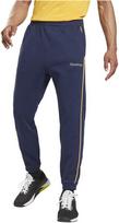 Sportinės kelnės vyrams Reebok Te Piping Jogger Blue GT5798, mėlynos