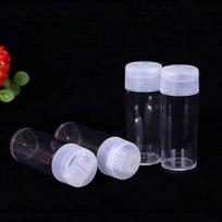 Plastikinis butelis su dvigubu uždoriu 2.3x6.5 cm -