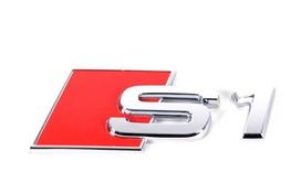 VAG AUDI A1 S1 2015-2018 Galinė bagažinės dalis S1 chromuotas ženkliukas su emblema 8X08537352ZZ originalus
