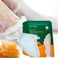 5 poros vitamino E ir manuka medaus pėdų kaukių