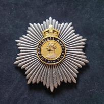 Didžiosios Britanijos Karalystės Kolonijinis Ordinas, britų Daxingmang ženklo kopija, ir siunčiama geležinė dėžutė.