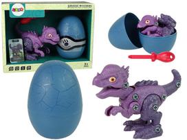 Mėlynas dinozauro kiaušinis su išardomu violetiniu dinozauru