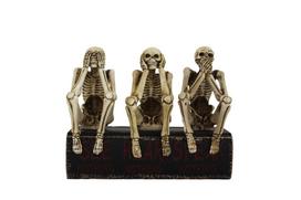 Skeletai „nematau, negirdžiu ir nesakau blogio". Išmatavimais: 15x8x12cm.