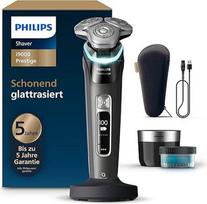 "Philips" skustuvas "i9000 Prestige" vyrams su integruotu trimeriu, juodas, slėgio jutiklis, valymo stotelė, įkrovimo stotelė ir kelioninis dėklas (modelis XP9207/30)