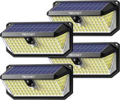 TECKNET Saulės šviesos žibintai lauke su judesio jutikliu, 4 LED saulės šviesos žibintų pakuotė, 300° lauko šviesa, IP66 vandeniui atsparūs saulės žibintai, saulės prožektoriai sodui, sienoms ir lauko apšvietimui