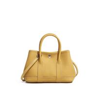 Design the new summer leather messenger women's bag, niche high-end portable small garden bag
