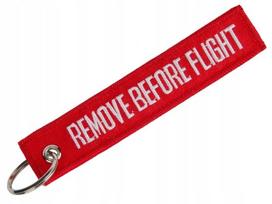 Oro linijų raktų pakabukas Mil-Tec "Remove Before Flight", redon