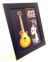 Jimmy Page mini gitara rėmelyje – kolekcinė dovana Led Zeppelin fanams
