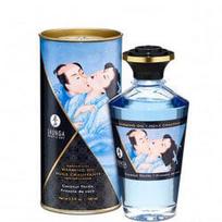 Šildantis afrodiziakų masažo aliejus Shunga Coconut Thrills, 100 ml