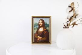Siuvinėjimo rinkinys kryželiu Mona Liza – klasikinis šedevras