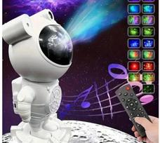Projektorius galaktikos ir žvaigzdžių projektorius, astronautas su kolonėle ir bluetooth garsiakalbiu