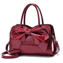 Women's Bag Butterfly Festival 2023 New Bright Leather Handbag with Large Capacity and Fashionable Middle-aged One-shoulder Cross-body CLE 30x12x20cm raudona