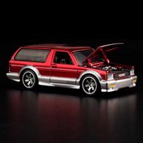 Hot Wheels Collectors RLC Exclusive Modeliukas 1992 GMC Typhoon “Bad Apple” Red (yra Sandėlyje)