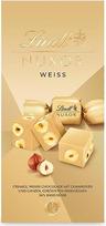 "Lindt" šokoladas "Nuxor White", 103 g maišelis, kreminis baltasis šokoladas su skrudintais lazdyno riešutais, šokolado dovana, šokolado dovana