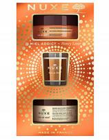 Kosmetikos rinkinys Nuxe Honey Lover Dry Skin Body Care: kūno šveitiklis, 175 ml + kūno balzamas, 200 ml + žvakė, 70 g