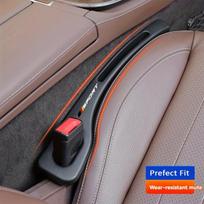 Automobilio sėdynės tarpų laikiklis
