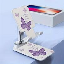 Telefono laikiklis Universalus mobiliojo telefono laikiklis su violetiniu drugeliu.