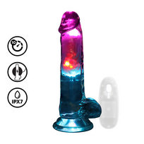 Realrock By Shots LED vibruojantis tiesus penis su kamuoliukais - 7" / 18 cm - permatomas