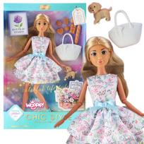 WOOPIE ROYAL Lėlė Lily 30 cm su pavasarine suknele, aksesuarais, šuniuku ir pikniko rinkiniu