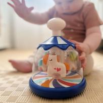 WOOPIE BABY Mėlynas sukutis-karuselė su spalvotais arkliukais