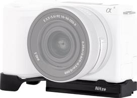 "Nitze ZV-E10 II" bazinė plokštelė "Sony ZV-E10 II", ZVE10 II bazinė plokštelė su integruota greitojo nuėmimo plokštele "Arca", diržo ąsa ir 1/4" sriegio skylėmis, suderinama su trikoju ir stabilizatoriumi - T-S15A