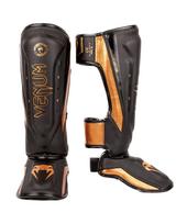 VENUM ELITE EVO blauzdos apsaugos Kojų apsaugos Apsauginės blauzdos Kovos menai Juoda x // Kickboxing, Treniruočių kovos, Įranga, Apsaugos, (Vidutinis, Bronzinis)