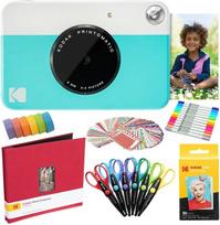 "Kodak Printomatic" momentinis fotoaparatas (mėlynas) + "Zink" popierius (20 lapų) + 8x8 medžiaginis albumas + 12 žymeklių su dvigubu antgaliu + 100 sienų lipdukų + 6 dekoratyvinės žirklės + "Washi" juosta