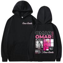 Omaro Courtzo „Primera Musa“ albumo turo atributika. Vyriški, moteriški, madingi, megztiniai su gobtuvu, hiphopo megztiniai su dideliais gobtuvais. XL raudona