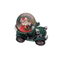 Sniego gaublys Kalėdų senelis automobilyje
