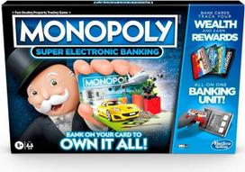 Stalo žaidimas "Monopoly Ultimate Rewards"; elektroninės bankininkystės įrenginys; pasirinkite savo apdovanojimus; žaidimas be grynųjų pinigų; bakstelėjimo technologija; skirtas nuo 8 metų amžiaus.