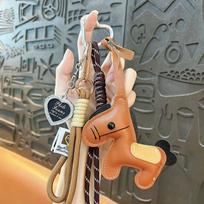 Cross-border miu series exquisite and cute cartoon dopamine leather pony braided rope keychain bag pendant pendant