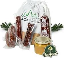 "Schwarzwaldmetzgerei Camping Bag" dovanų krepšelis - 6 dalių dovanų krepšelis su gardžiais dešrelių patiekalais, tokiais kaip "Pepper Berry", "Country Hunter", "Farmer's Sausages", "Cherry Water Salami" ir "Pear Chili Dip