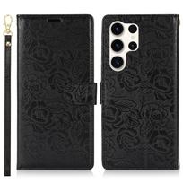 Odinis piniginės atlenkiamas apsauginis dangtelis riešo dirželis kortelių lizdų laikiklis kišenė reljefinis rožės gėlės stovas Samsung Galaxy A12 A13 A26 A15 A16 A25 A31 Samsung Galaxy M33 juoda