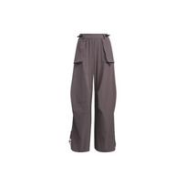 Adidas City Escape sportinio kostiumo kelnės su reljefiniu logotipu ir šoninėmis kišenėmis Moteriškos kelnės Anglies pilkumo JE8583 XL gray