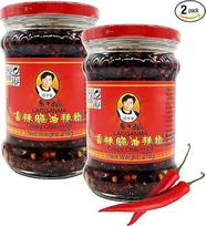 "Lao Gan Ma" traškūs čili pipirai aliejuje, 2 vnt. (2 x 210 g) - traškūs čili pipirai aliejuje - dviguba pakuotė, sudaryta "Pikaflor