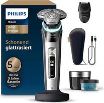 "Philips" skustuvas "i9000 Prestige" vyrams su šlapiu ir sausu skustuvu, integruotu trimeriu, pilkas/ sidabrinis, slėgio jutikliu, valymo stotele, 5+1 barzdaskute, įkrovimo stotele ir kelioniniu dėklu, modelis XP9204/33