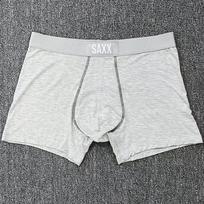 SAXX vyriški kvėpuojantys bokseriai su kišene ir tinkleliu – Patogūs, Minkšti, Priglundantys, Be priekinės angos EU M for 120-140 lbs šviesiai pilka spalva