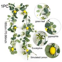 Dirbtiniai imituoti žali augalai, tokie kaip eukalipto lapai, citrinų vijokliai ir vijokliai, yra pakabinami namų ir lauko dekoravimui Little lemon vine