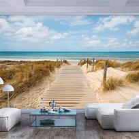 Fototapetas Artgeist Vacation Landscape - Wooden Path Leading to the Tranquil Sea LNEW011159SAM, 140 cm x 196 cm