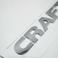 VAG VOLKSWAGEN CRAFTER MK2 Galinis užrašo ženkliukas 2E0853687A2ZZ Originalus