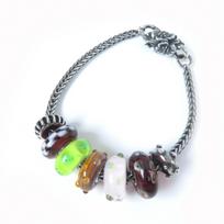 Puikus Trollbeads apyrankės rinkinys iš 7 sagčių ir karoliukų pakabukų Sidabras SV925 Moterims Naudotas
