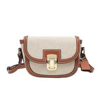Retro Saddle Bag Canvas Leather Splicing Crossbody Metal Buckle Decoration Shoulder Hundred Niche Armpit Bag abrikosas