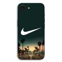 Dėklas iPhone 17e Nike logotipas fonas Kalifornijos palmės naktį Maniacase juoda