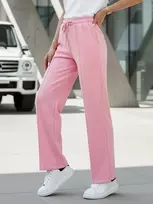 Moteriškos rožinės sportinės kelnės Dress