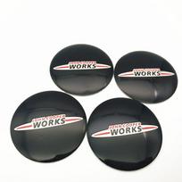 4 vnt. Automobilio rato centrinio dangtelio lipdukas JOHN COOPER WORKS logotipui MINI Cooper Clubman Cabrio Paceman R50 R52 jcw R55