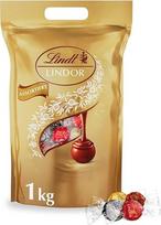 "Lindt LINDOR" šokolado rutuliukai "Classic Mix", apie 80 šokolado rutuliukų (nenugriebto pieno, baltojo, tamsaus 60 %, lazdyno riešutų), biri pakuotė, 1 kg
